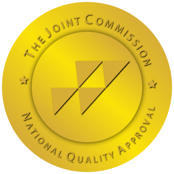 A yellow circular badge with the text 